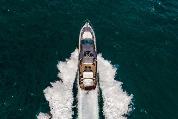 Slide: The Image of Aerial view of a 2015 Pershing 70 yacht cruising on the ocean. - 9
