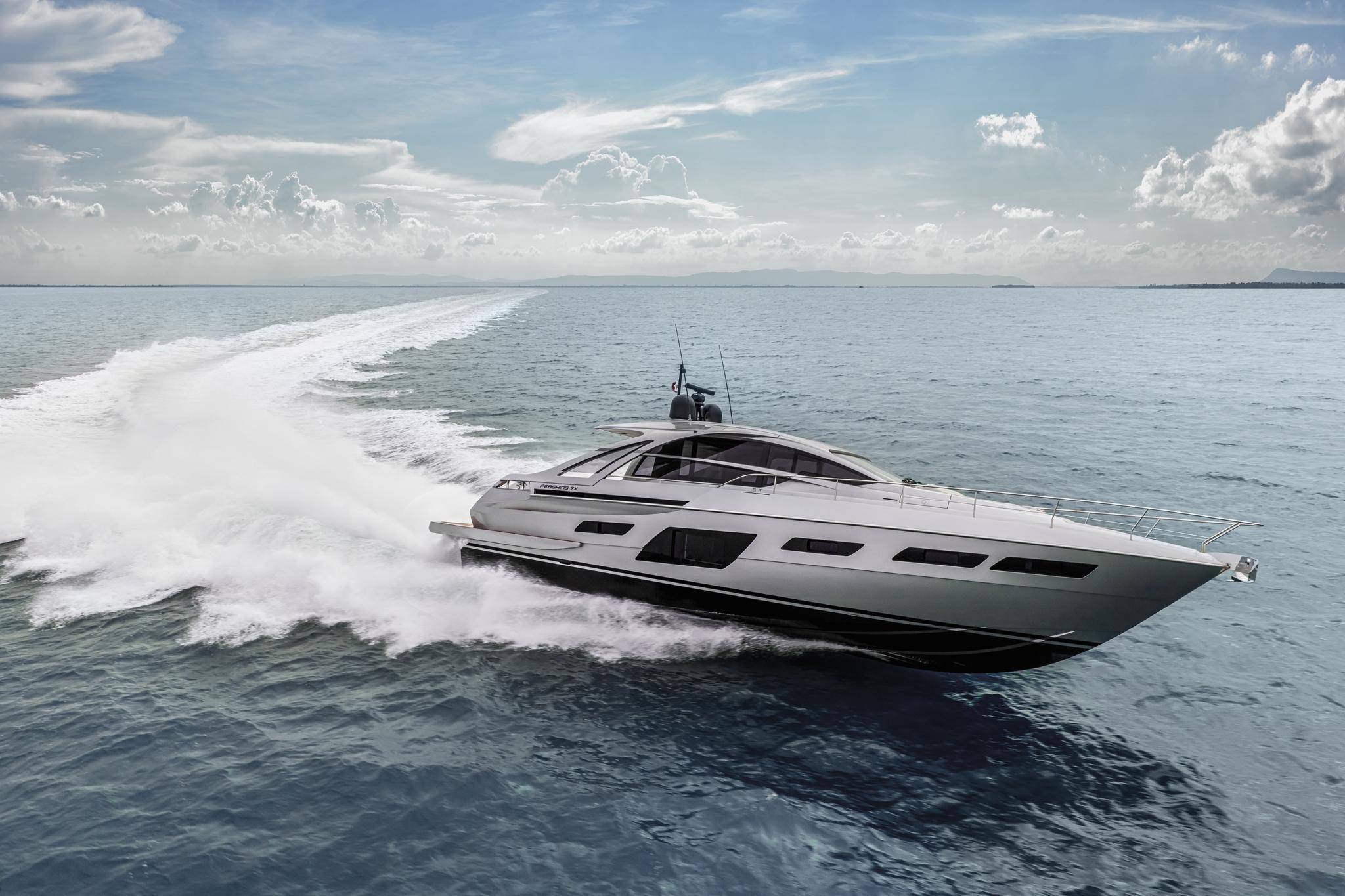 Slide: The Image of 2025 Pershing 7X yacht cruising swiftly on open water under a clear sky. - 0