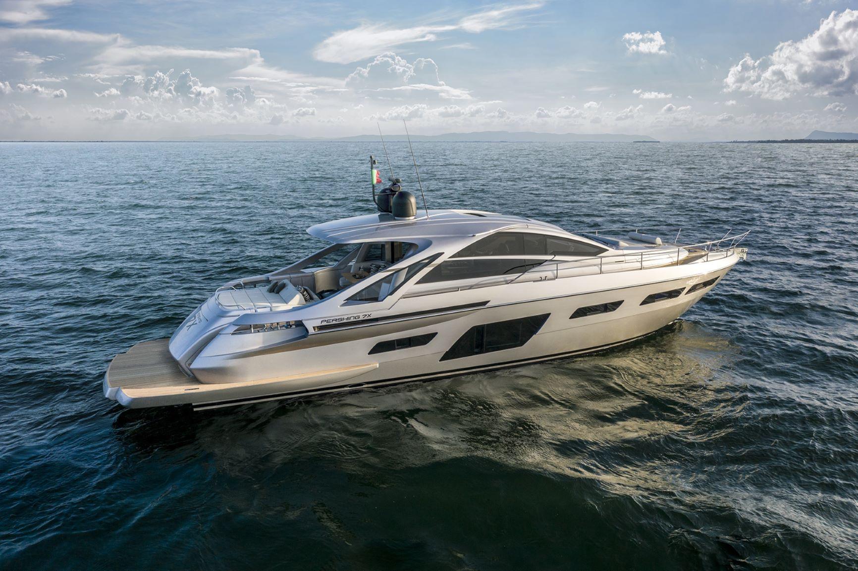 Slide: The Image of 2025 Pershing 7X yacht cruising on open sea under a partly cloudy sky. - 1