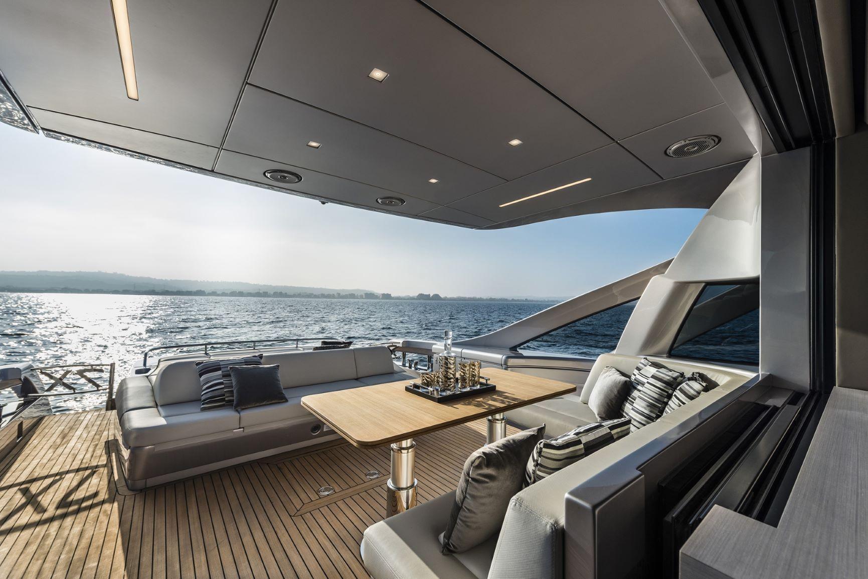 Slide: The Image of Luxurious 2025 Pershing 7X yacht deck with elegant seating and ocean view. - 10