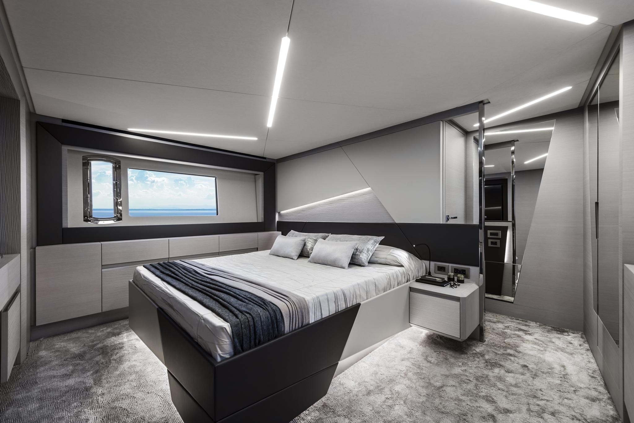 Slide: The Image of Luxurious bedroom interior of 2025 Pershing 7X yacht with modern design and ocean view. - 20