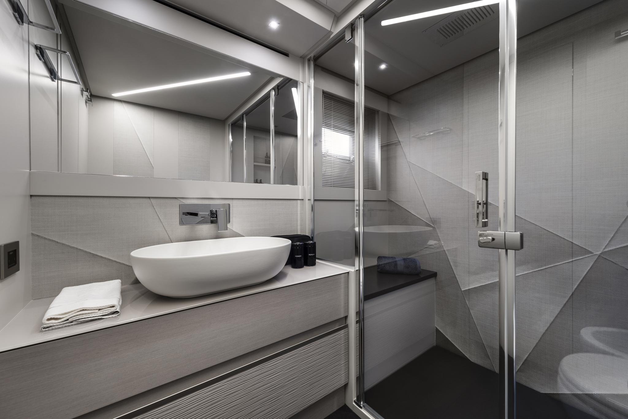Slide: The Image of Luxurious bathroom in 2025 Pershing 7X yacht with modern fixtures and sleek design. - 23