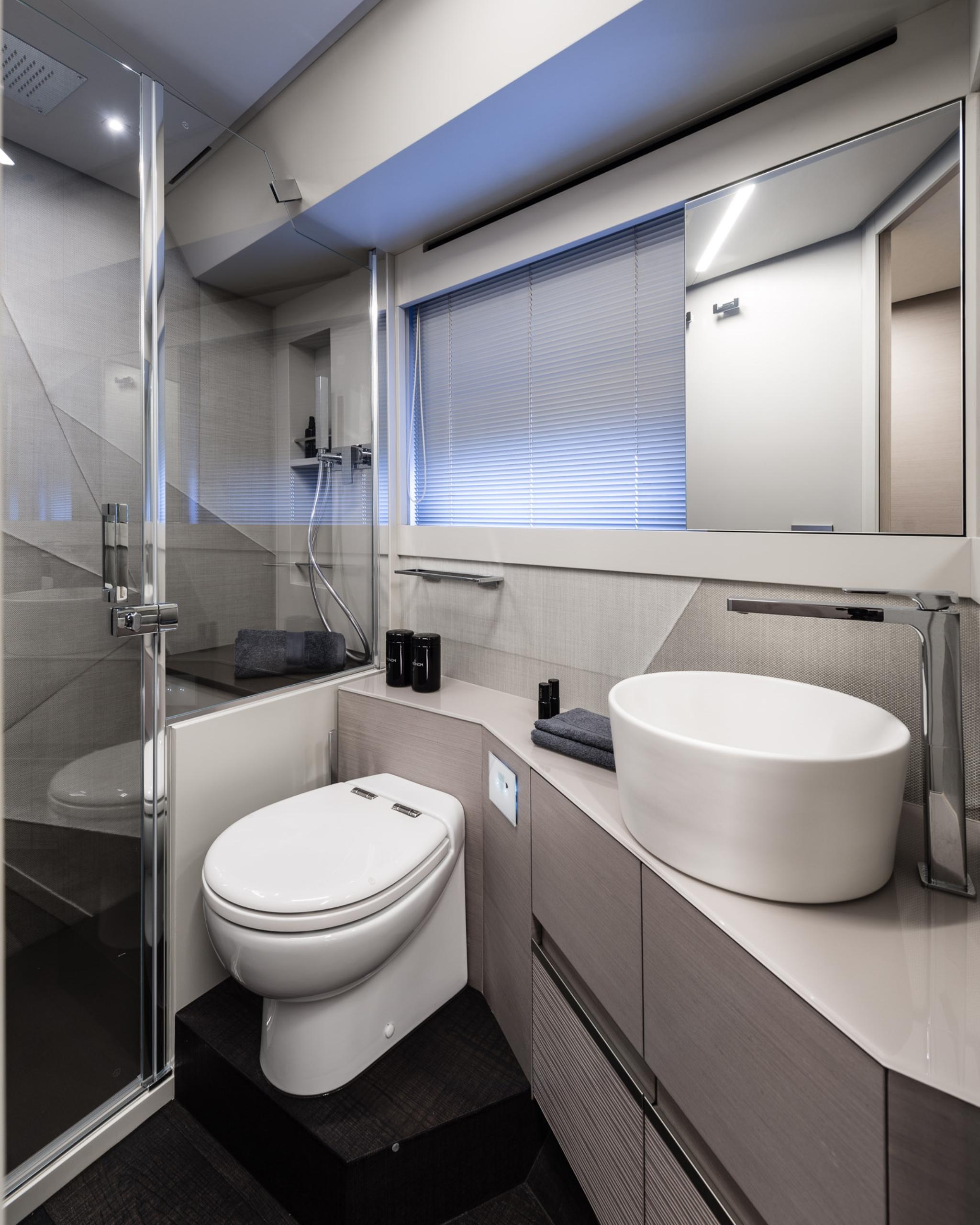 Slide: The Image of Luxurious bathroom in 2025 Pershing 7X yacht, featuring modern fixtures and sleek design. - 26