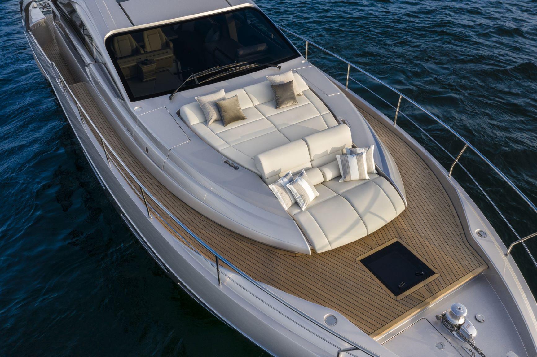 Slide: The Image of Luxurious 2025 Pershing 7X yacht with elegant deck and plush seating on the water. - 5