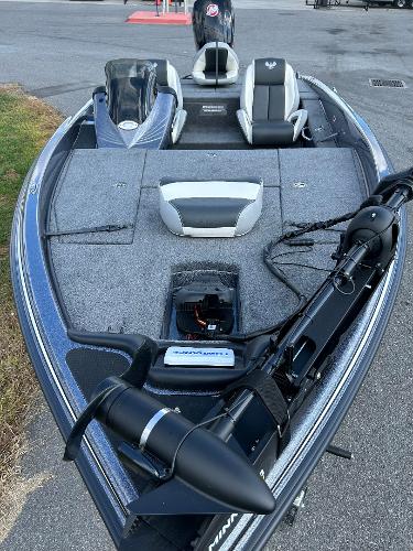 Slide: The Image of 2024 Phoenix 518 Pro fishing boat with advanced equipment and seating. - 2