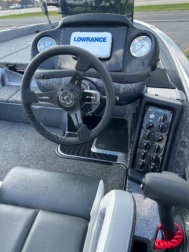 Slide: The Image of 2024 Phoenix 518 Pro boat dashboard with Lowrance electronics. - 5