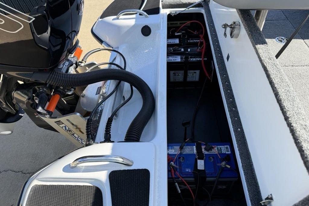 Slide: The Image of 2019 Phoenix 618 Pro boat showing engine and battery compartment details. - 17