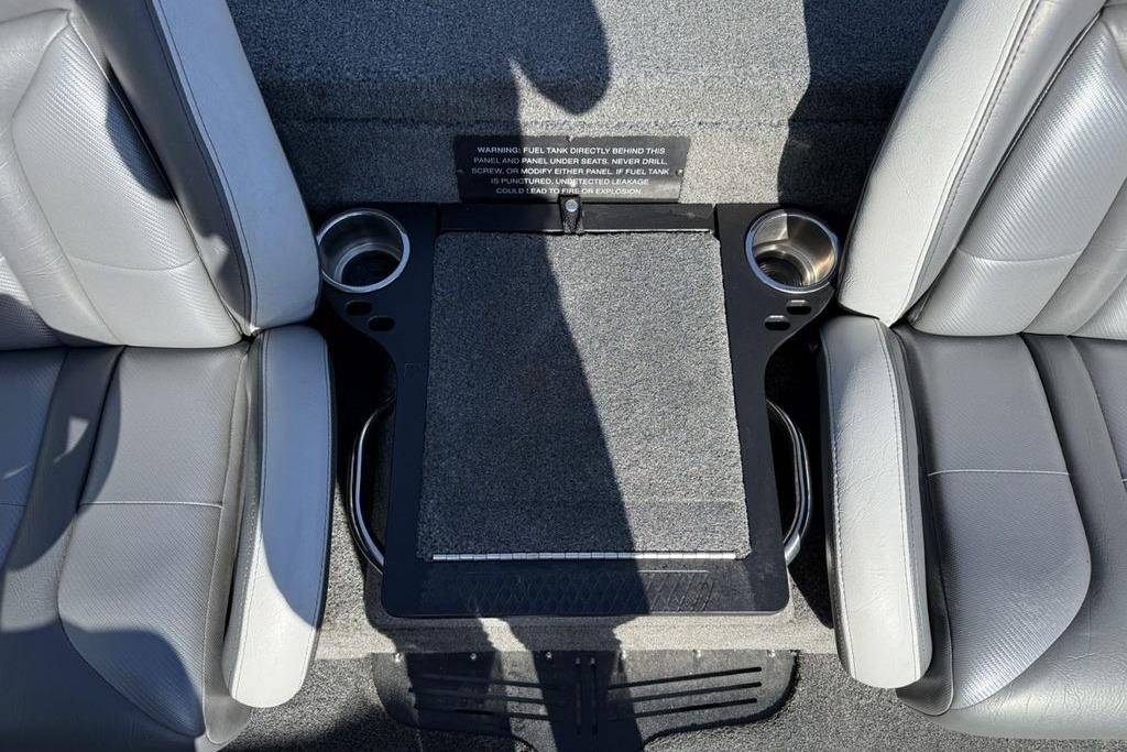 Slide: The Image of Interior of 2019 Phoenix 618 Pro boat with gray seats and cup holders. - 5