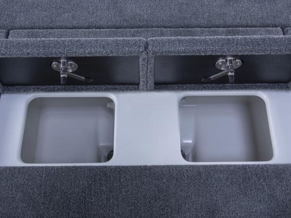 Slide: The Image of Phoenix 818 Pro 2025 boat storage compartments with secure latches and carpeted finish. - 4