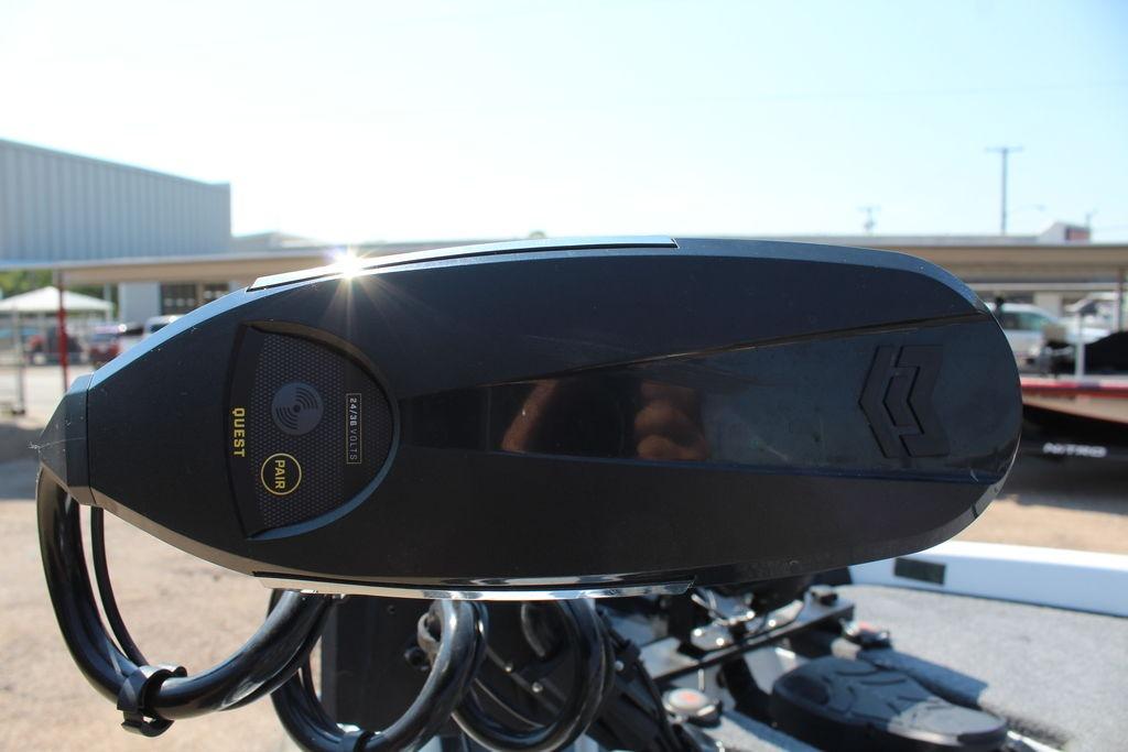 Slide: The Image of Close-up of a 2024 Phoenix 819 Pro boat component with sunlight reflection. - 11