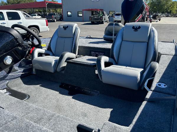 Slide: The Image of 2024 Phoenix 819 Pro boat interior with dual seats and steering console. - 5