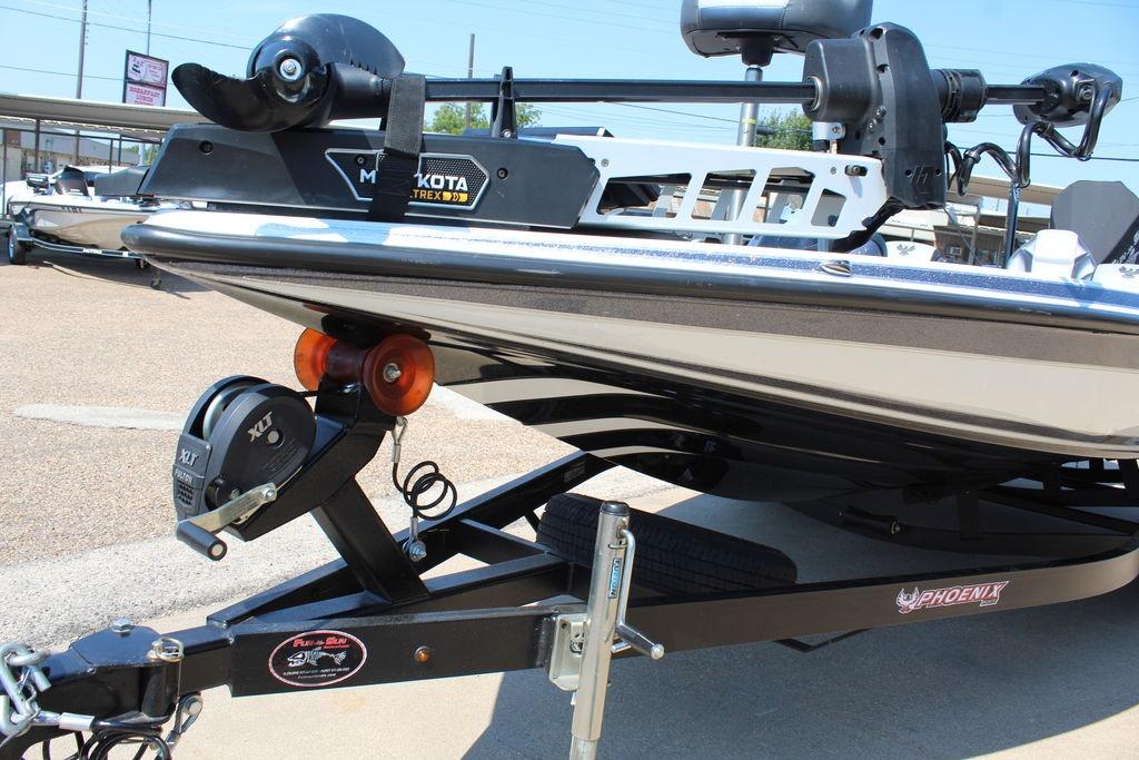 Slide: The Image of 2024 Phoenix 819 Pro boat on trailer with Minn Kota trolling motor. - 6