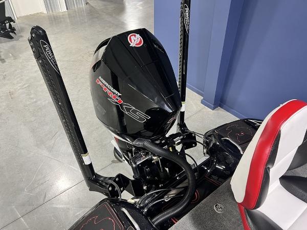 Slide: The Image of 2022 Phoenix 919 Pro XP boat engine with dual power poles in a showroom. - 21