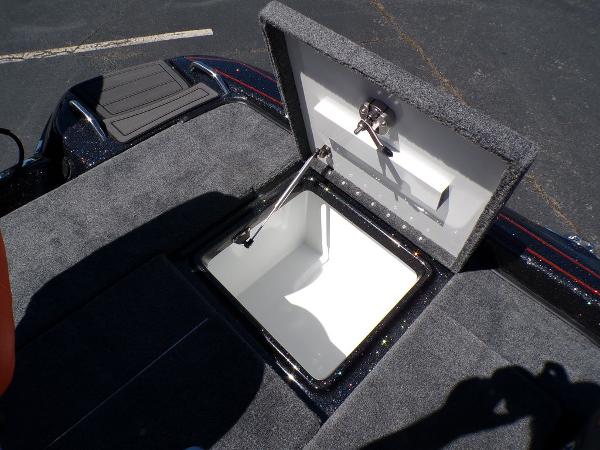 Slide: The Image of 2024 Phoenix 919 Pro XP boat storage compartment with open lid. - 22