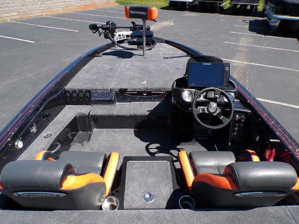 Slide: The Image of 2024 Phoenix 919 Pro XP boat interior with dual seats and advanced navigation system. - 9