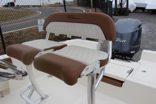Slide: The Image of Pioneer 220 Bay Sport 2022 boat seats with Yamaha 250 engine in background. - 7