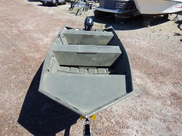 Slide: The Image of 2018 Polar Kraft Jon 1448 LW aluminum fishing boat on gravel lot. - 10