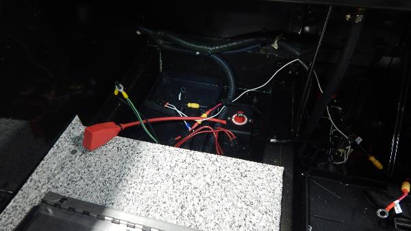 Slide: The Image of Battery compartment of 2024 Polar Kraft Outlander 186 SC boat with wiring. - 11