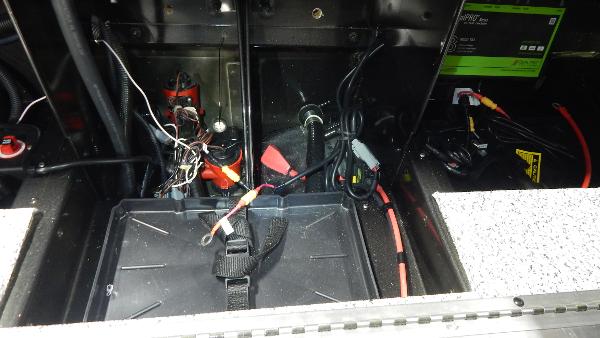 Slide: The Image of 2024 Polar Kraft Outlander 186 SC boat battery compartment and wiring. - 12