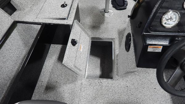 Slide: The Image of 2024 Polar Kraft Outlander 186 SC boat interior with open storage compartment. - 18