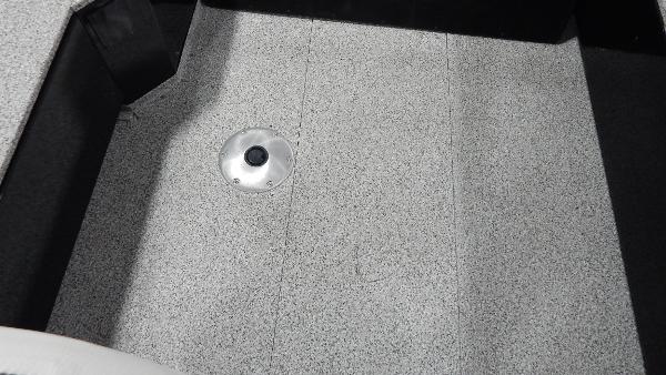 Slide: The Image of 2024 Polar Kraft Outlander 186 SC boat interior flooring. - 30