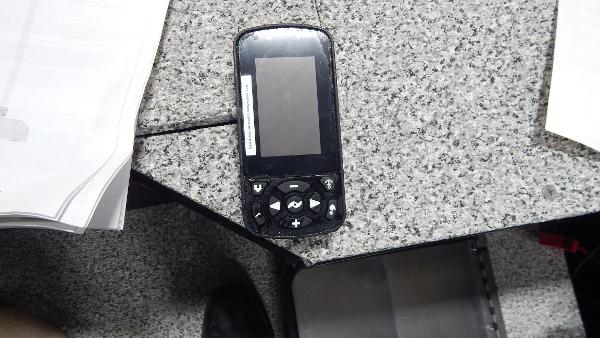 Slide: The Image of Handheld GPS device on a granite countertop, Polar Kraft Outlander 186 SC, 2024. - 6