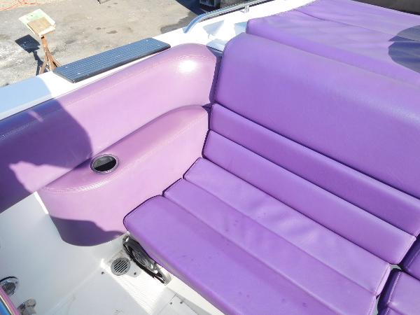 Slide: The Image of Purple seating on 1997 Powerplay Powerboats 28 Sport Deck. - 11