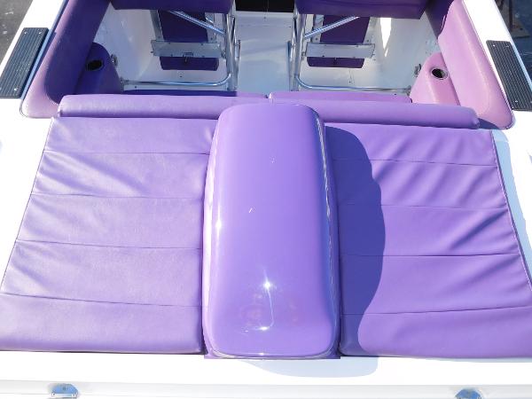 Slide: The Image of Purple seating on 1997 Powerplay Powerboats 28 Sport Deck. - 13