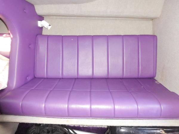 Slide: The Image of Purple seating inside 1997 Powerplay Powerboats 28 Sport Deck. - 23