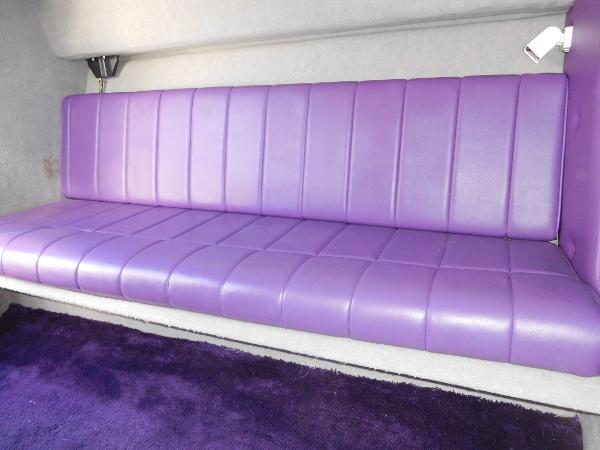 Slide: The Image of Purple seating in 1997 Powerplay Powerboats 28 Sport Deck interior. - 24