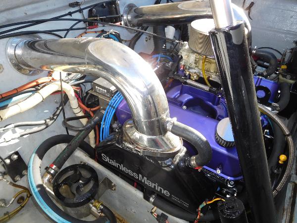 Slide: The Image of Engine of 1997 Powerplay Powerboats 28 Sport Deck with stainless marine components. - 28