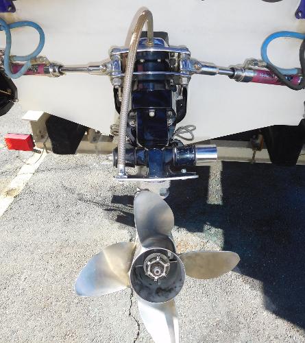 Slide: The Image of 1997 Powerplay Powerboats 28 Sport Deck propeller and drive system close-up. - 29