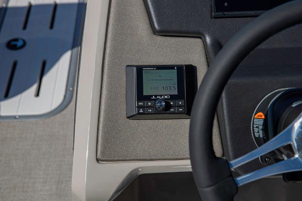 Slide: The Image of Close-up of the dashboard on a 2023 Premier 220 Castaway boat. - 11