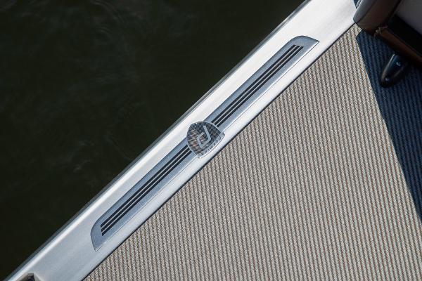 Slide: The Image of 2023 Premier 220 Castaway boat deck detail with logo. - 27