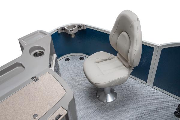 Slide: The Image of 2023 Premier 220 Castaway boat interior with a comfortable captain's chair and cup holders. - 33