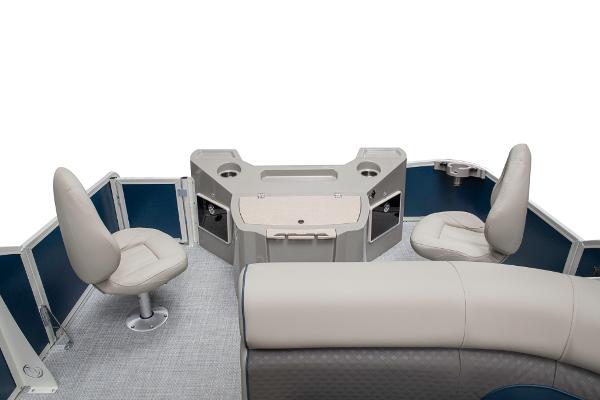 Slide: The Image of 2023 Premier 220 Castaway boat interior with seating and storage compartments. - 35