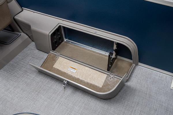 Slide: The Image of 2023 Premier 220 Castaway storage compartment with open hatch. - 38