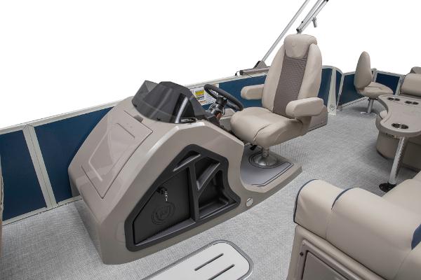 Slide: The Image of 2023 Premier 220 Castaway boat interior with captain's chair and control console. - 40