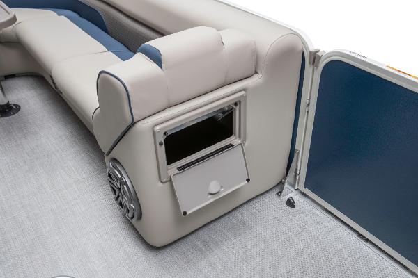 Slide: The Image of 2023 Premier 220 Castaway boat interior with storage compartment and seating. - 43