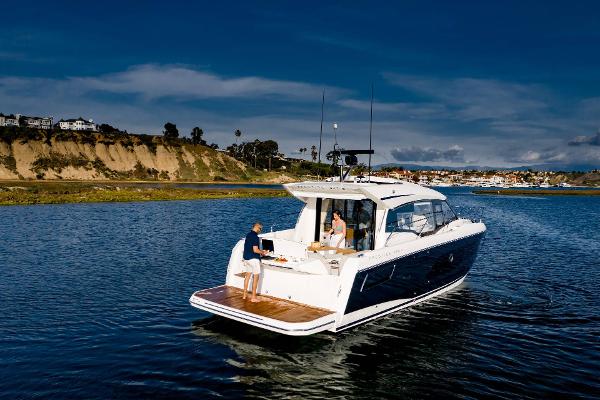 Slide: The Image of 2025 Prestige 420S yacht cruising on scenic coastal waters. - 3
