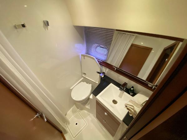 Slide: The Image of Luxurious bathroom in 2013 Prestige 440 S yacht with modern fixtures and sleek design. - 22