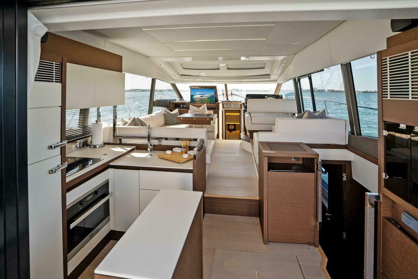 Slide: The Image of 2018 52 Prestige S - The Islanders - Salon/ Galley Overview - 4764105