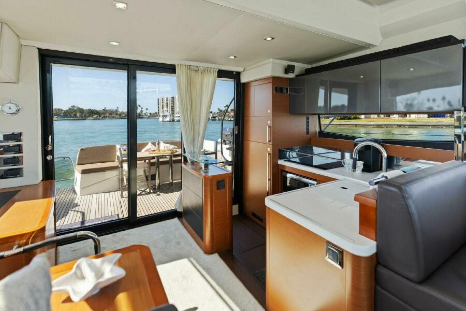 Slide: The Image of 2016 55 Prestige 550S - Solid Asset - Salon/Galley - 5125097
