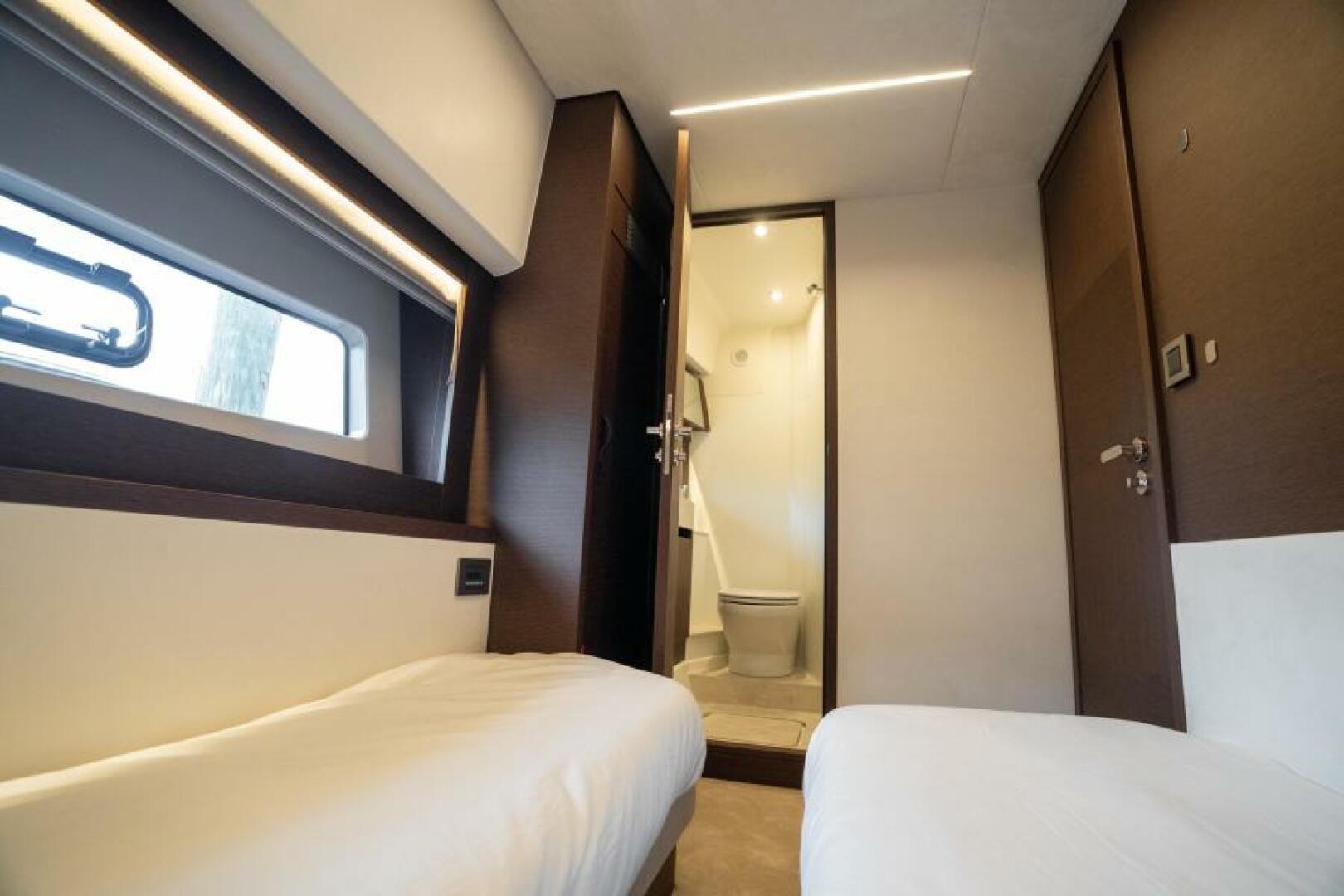 Slide: The Image of 2022 59 Prestige Flybridge - Nice Boat - Guest Stateroom - Head Entry - 3976931