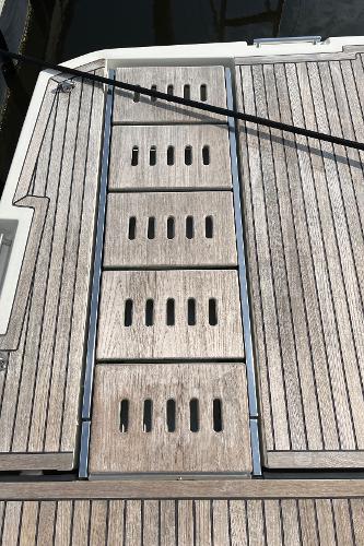Slide: The Image of Teak deck of 2017 Prestige 63 yacht with slotted design. - 13