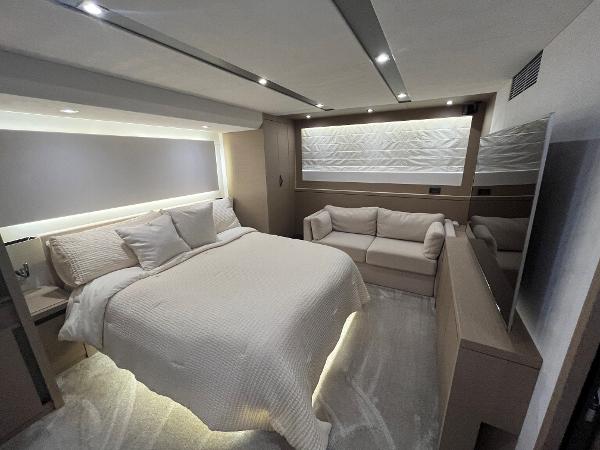 Slide: The Image of Luxurious bedroom interior of 2017 Prestige 63 yacht with modern design and ambient lighting. - 32