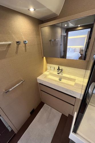 Slide: The Image of Luxurious bathroom interior of a 2017 Prestige 63 yacht with modern fixtures. - 37