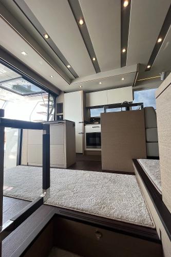 Slide: The Image of Luxurious interior of a 2017 Prestige 63 yacht with modern kitchen design. - 38