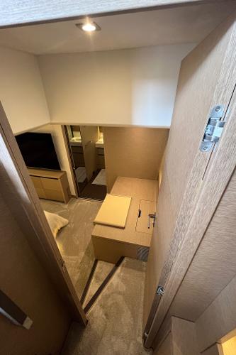 Slide: The Image of Interior of 2017 Prestige 63 yacht, featuring modern design and cozy cabin space. - 39
