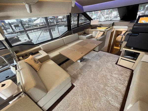 Slide: The Image of Luxurious interior of a 2017 Prestige 63 yacht with elegant seating and modern design. - 41